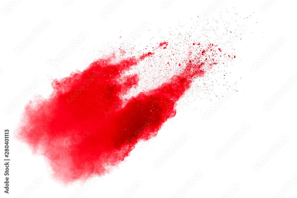Abstract red dust splattered on white background. Red powder explosion.Freeze motion of red particles splashing.