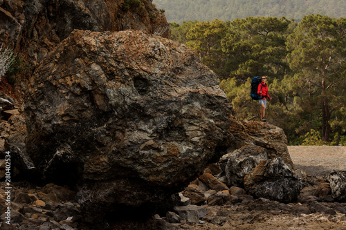 Female traveller trekking on hills in Turkey photo