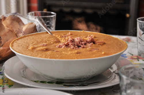 Family size plate of homemade delicious traditional Porra antequerana soup. This gazpacho and salmorejo family of soups is originating in Andalusia, in southern Spain and is normaly served as tapas photo