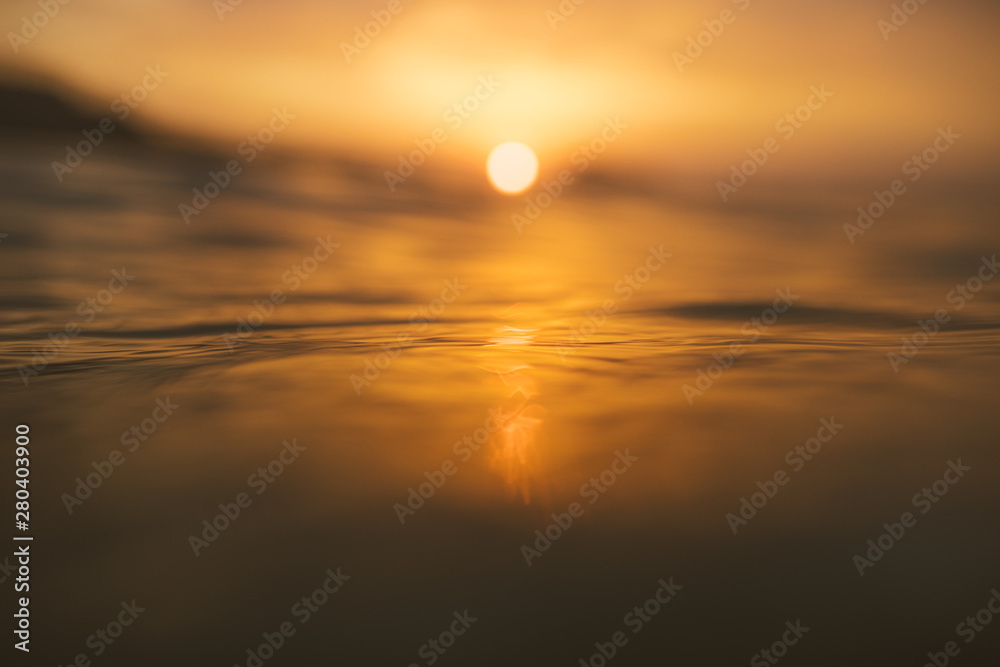 Abstract golden sea  with a red sunset