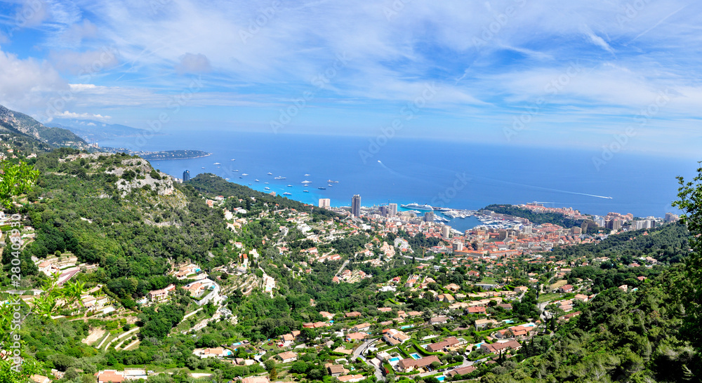 Breathtaking Panorama of Monaco and the italian coast of Mediterranean (area of Sanremo) from the viewpoint in La Tourbie town, south of France (street Capouane)