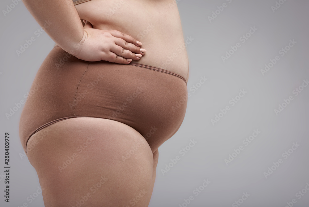 Close up of fat woman wearing big size underwear