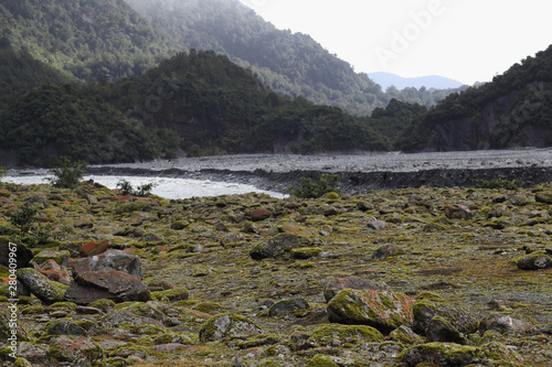 Green valley,moss and stones and Mountain in Franz Josef Glacier, New Zealand South Island