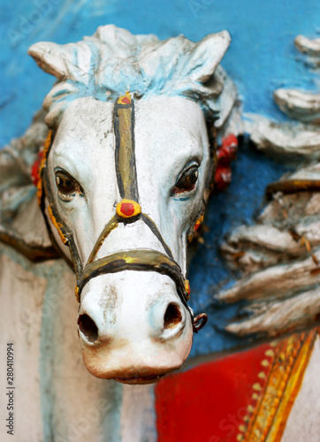 Closeup of Wall art of a horse head in a Hindu temple