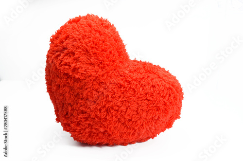 Red heart pillow on white background