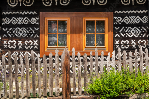 Obraz na płótnie Old wooden houses in Slovakia UNESCO village Cicmany. The ornaments from Cicmany, and the Slovak folk pattern. w salonie