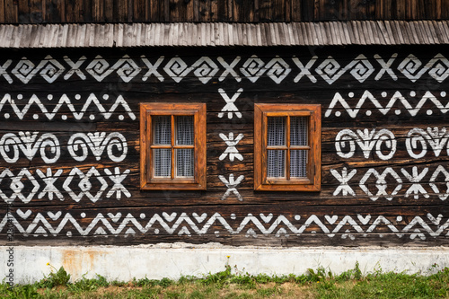 Obraz na płótnie Old wooden houses in Slovakia UNESCO village Cicmany. The ornaments from Cicmany, and the Slovak folk pattern. w salonie