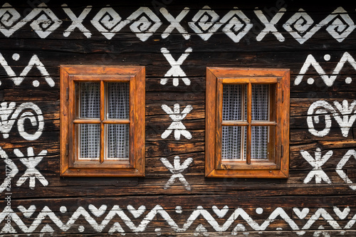 Obraz na płótnie Old wooden houses in Slovakia UNESCO village Cicmany. The ornaments from Cicmany, and the Slovak folk pattern. w salonie