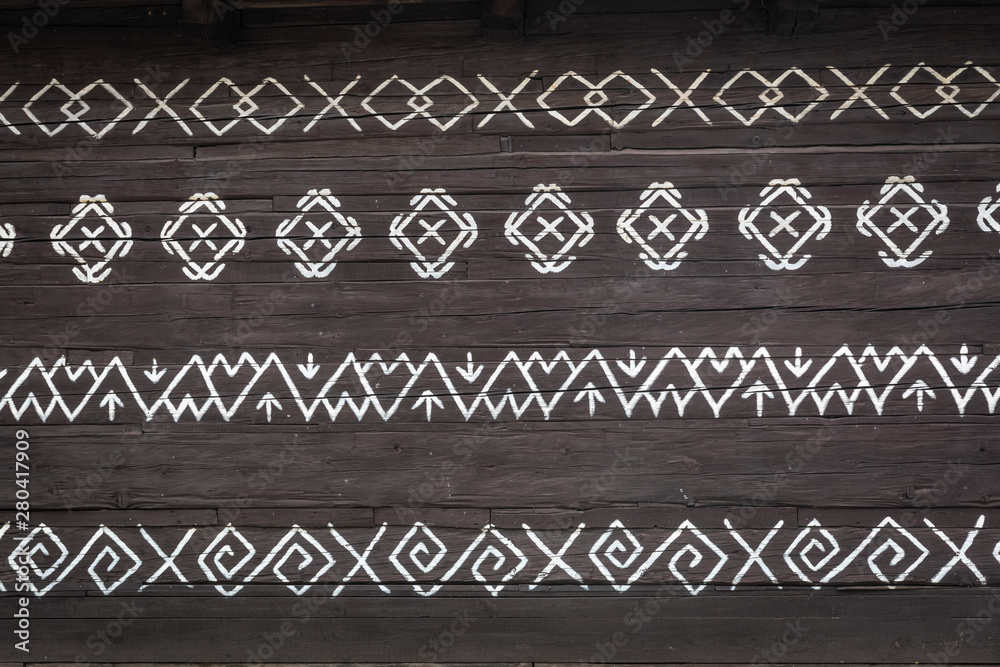Old wooden houses in Slovakia UNESCO village Cicmany. The ornaments from Cicmany, and the Slovak folk pattern.