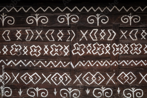 Obraz na płótnie Old wooden houses in Slovakia UNESCO village Cicmany. The ornaments from Cicmany, and the Slovak folk pattern. w salonie