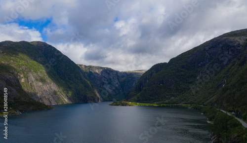View on beautiful landscape with water of fjord and mountains at sunny summer day  Akrafjorden  Hordaland Hardangervidda  Norway