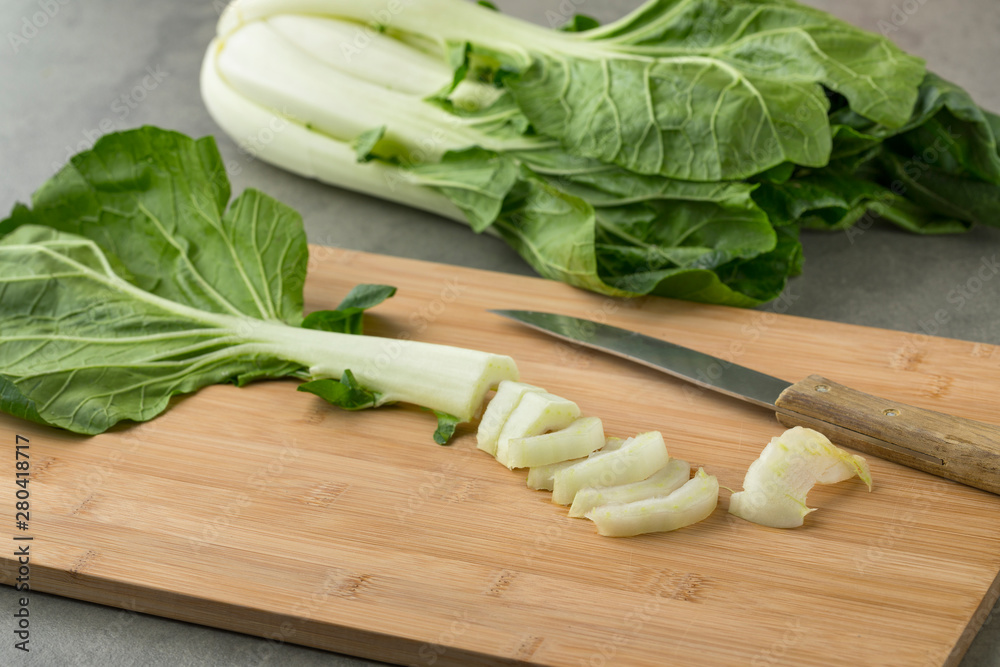 Fresh raw paksoy cut into slices Fresh raw paksoy cut into slices