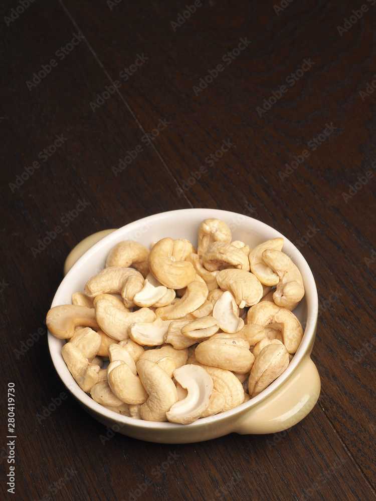 Healthy eating concept with cashew nuts Healthy eating concept with cashew nuts