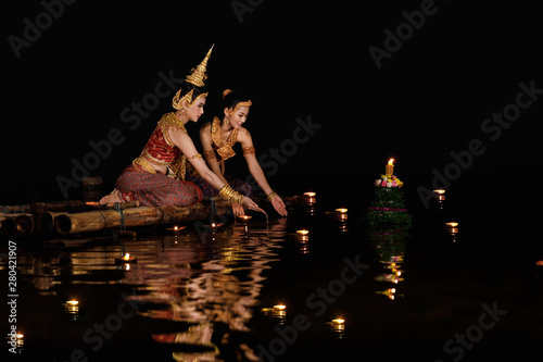 beautiful thai model wearing thai traditiomal loy kratong festival photo