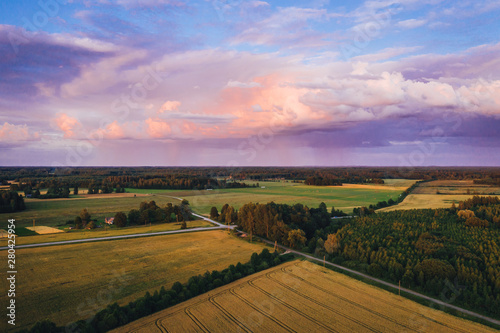 Beautiful storm cloud formation over rural country are in summer sunset