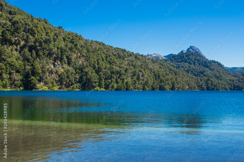 Lago Espejo Grande near Villa la Angostura in Neuquen Province, Argentina. Beautiful sunset on Lago Espejo Grande Lago Espejo Grande near Villa la Angostura in Neuquen Province, Argentina. Beautiful sunset on Lago Espejo Grande