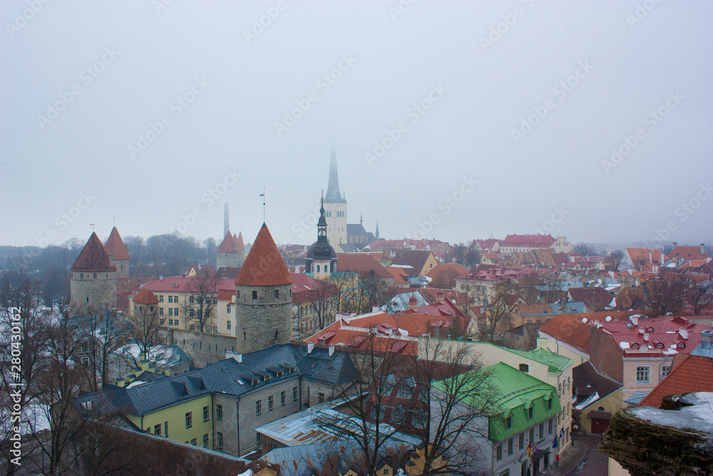 Red Tiled roofs of the old city. Tallinn Estonia - 06/11/2019. Summer sunny day. View from above. Top panorama on Vanalinn Kesklinn, Midtown. Historic Centre (Old Town) of Tallinn. Amazing aerial.