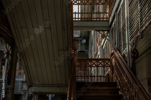 The stairs to the 2nd floor of old city hall, European style building. The vintage white wooden house was left to deteriorate over time, Once be Former city hall.