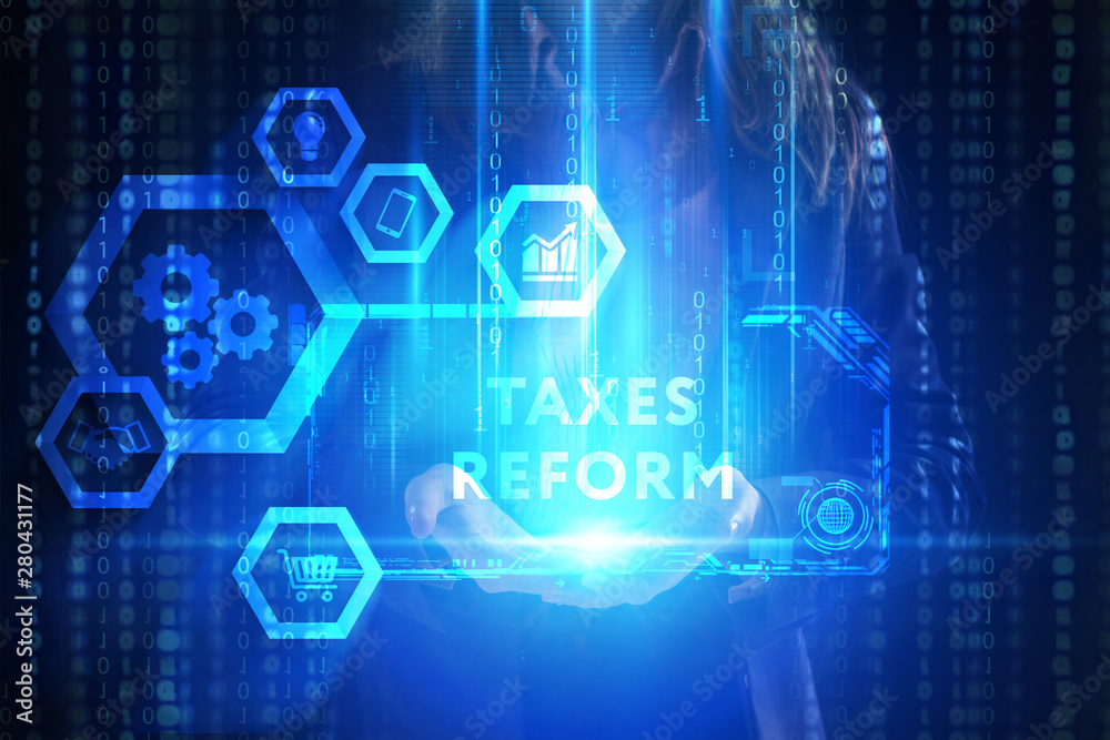 Fototapeta premium The concept of business, technology, the Internet and the network. A young entrepreneur working on a virtual screen of the future and sees the inscription: taxes reform