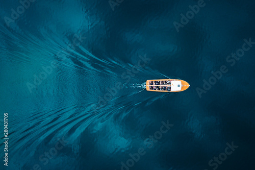 Overhead view of boat on blue water
