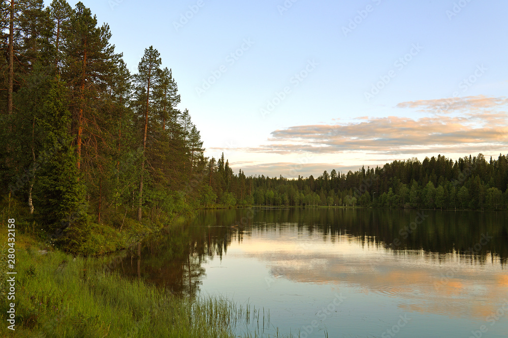 Beautiful sunset on Talvijarvi Lake in Ruka, Lapland, Finland