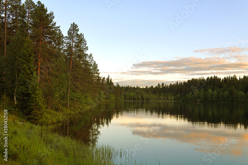 Beautiful sunset on Talvijarvi Lake in Ruka, Lapland, Finland