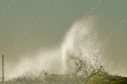 Wave spray as waves break into strong headwind is called spindrift photo