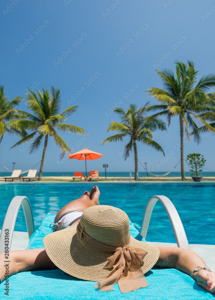 Beautiful woman at the swimming pool Beautiful woman at the swimming pool