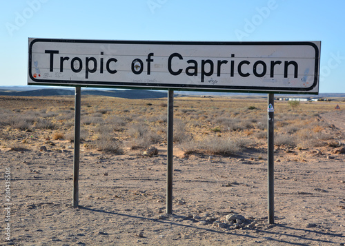 Sign of Tropic of Capricorn on C14 Namibia (or the Southern Tropic) is the circle of latitude that contains the subsolar point on the December (or southern) solstice photo