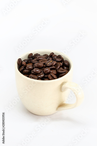 White cup of coffee and coffee grains with clipping path