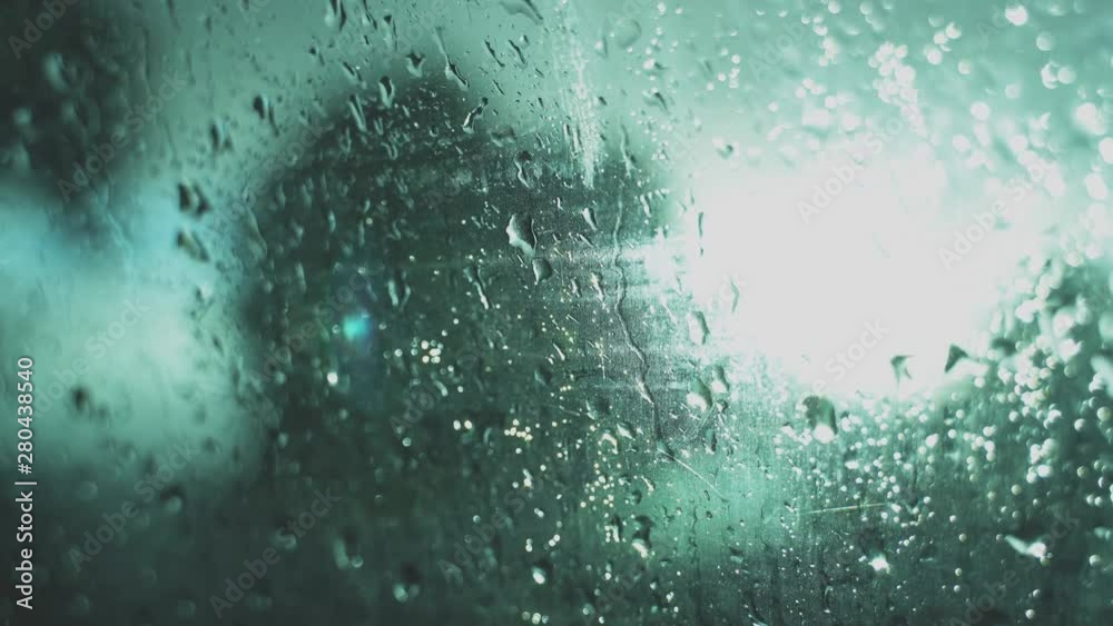 Rain knocks on the glass in the car. Rain knocks on the glass in the car.