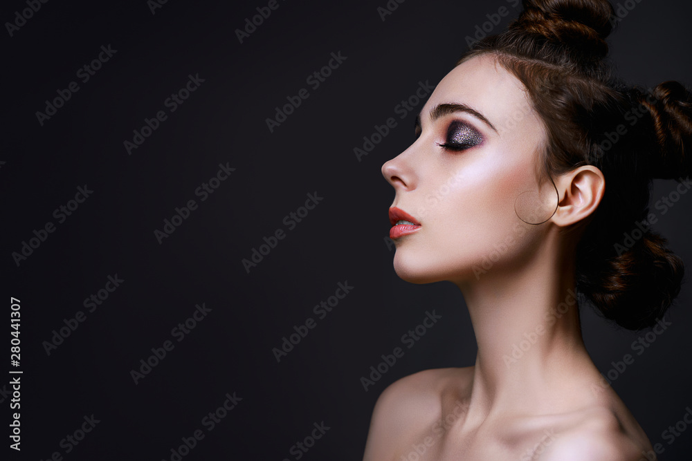 Fototapeta premium Young beautiful girl with fancy Halloween party hairdo and make-up, copy space