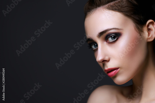 Young beautiful girl with fancy Halloween party hairdo and make-up  copy space