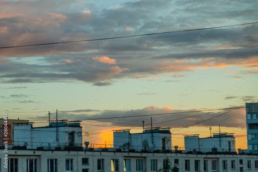 City buildings in the early summer evening City buildings in the early summer evening