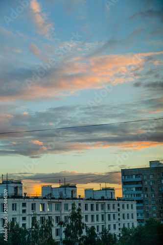 City buildings in the early summer evening