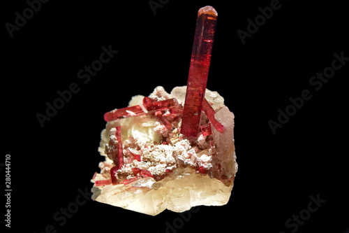 Photo of Elbaite (Rubellite) isolated on black background