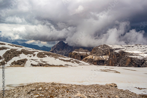 View from Monte Piz Boè with snow and storm clouds, Sella group in the province of Trento - Italy