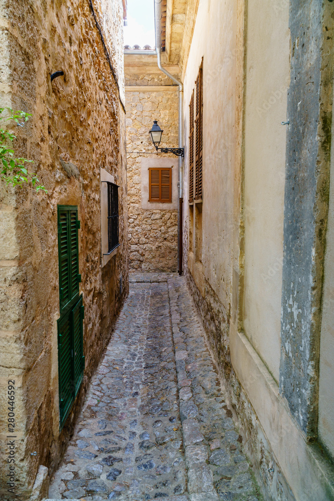 Narrow alley in mediterranean touristic destination Valldemossa, Majorca