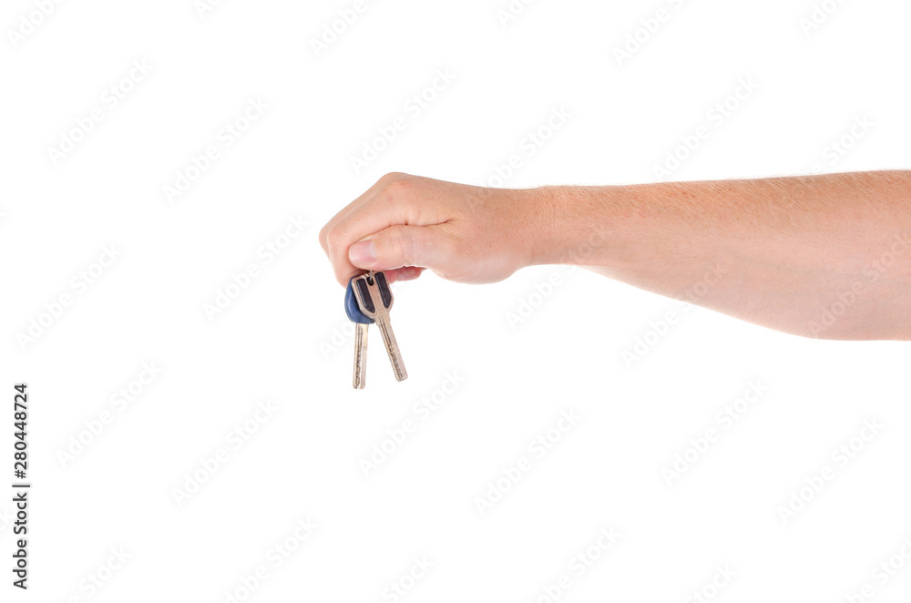 A man holds the keys to the lock in the palm on a white background A man holds the keys to the lock in the palm on a white background