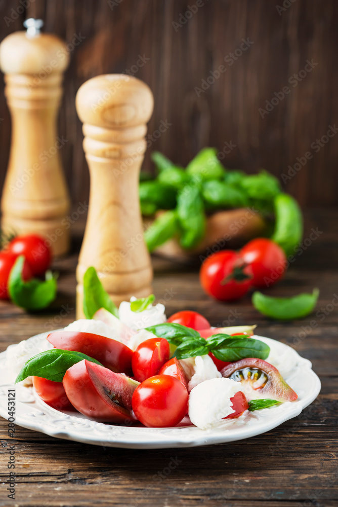 Italia salad caprese with tomato, basil and mozzarella Italia salad caprese with tomato, basil and mozzarella