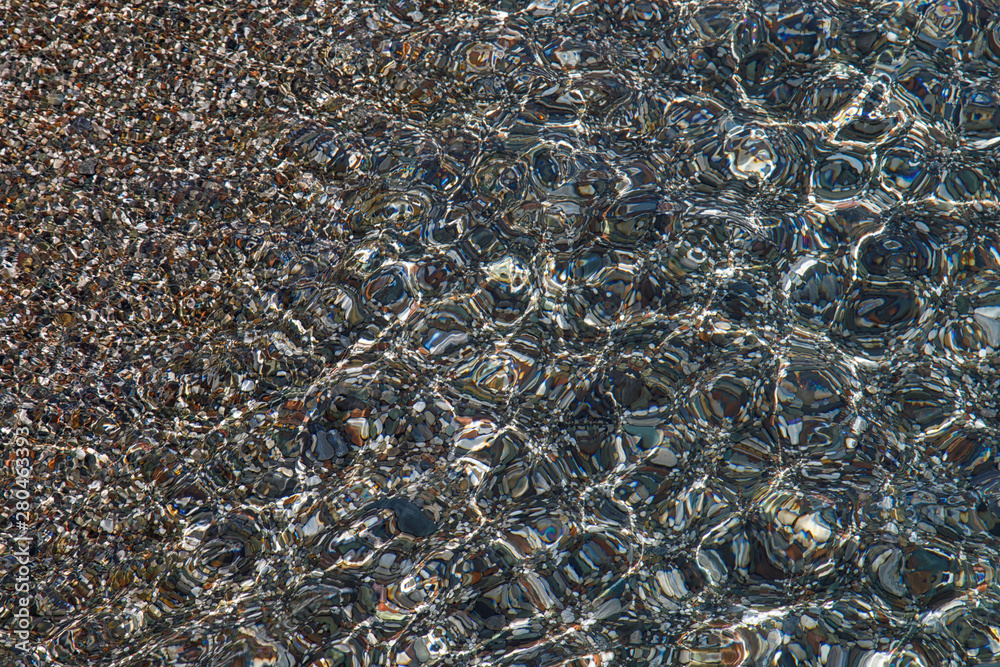 Stones on the bottom of the sea throw the water Stones on the bottom of the sea throw the water