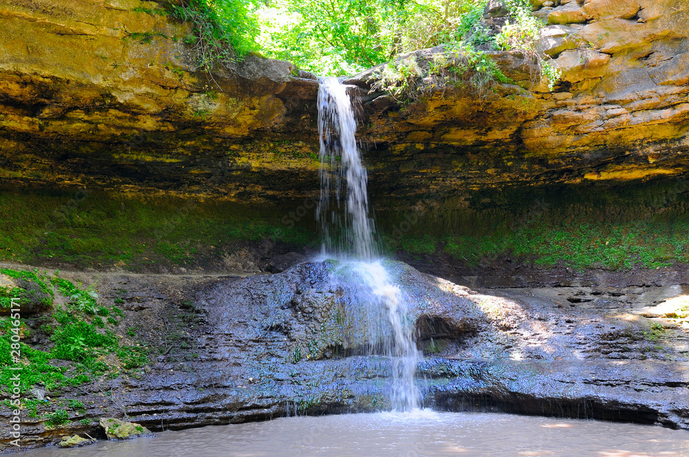 Fototapeta premium Waterfall in the mountain.