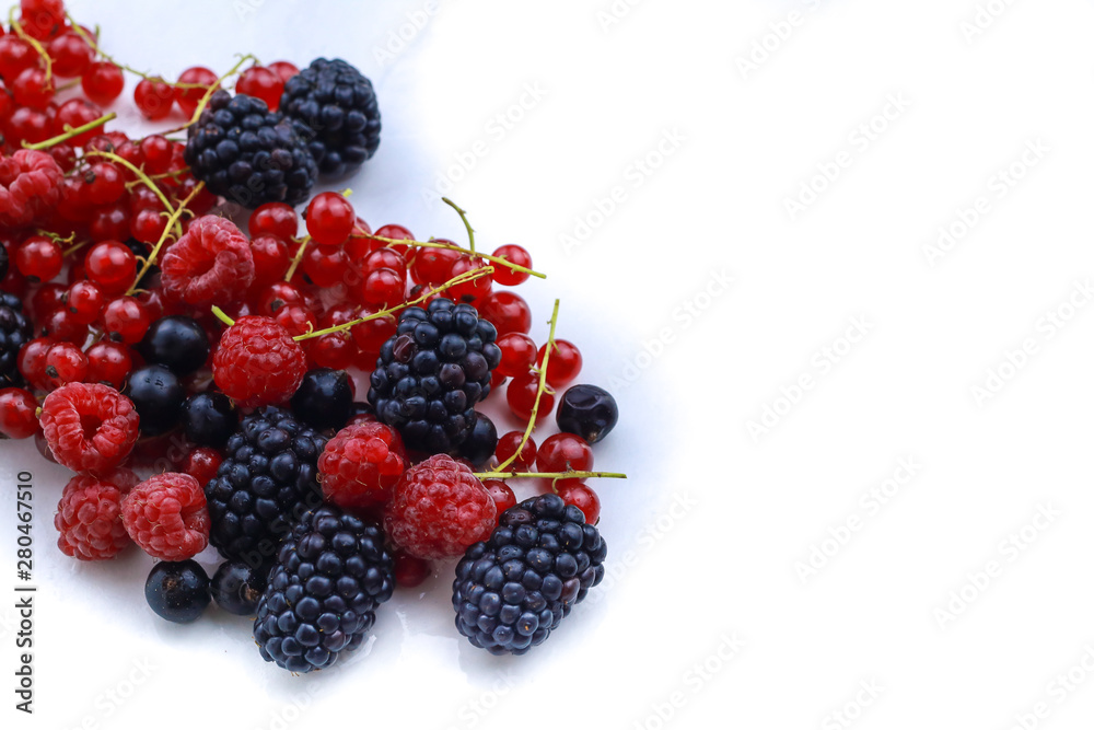 Assortment of ripe berries isolated on white Assortment of ripe berries isolated on white