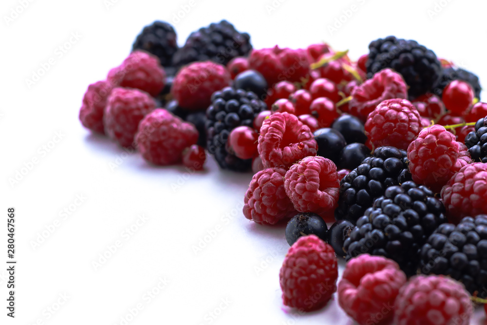 Assortment of ripe berries isolated on white Assortment of ripe berries isolated on white