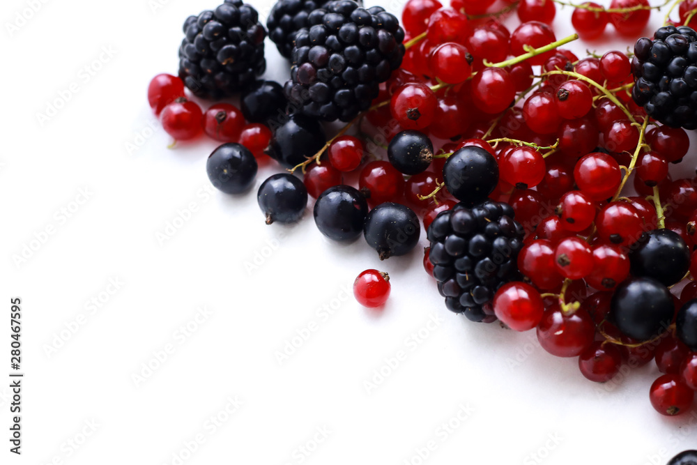 Assortment of ripe berries isolated on white