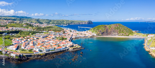 Fort de San Sebastian, idyllic praia (beach) and azure turquoise baia (bay) do Porto Pim, red roofs of historical touristic Horta town centre, Monte (mount) Queimado, Faial island, Azores, Portugal. photo