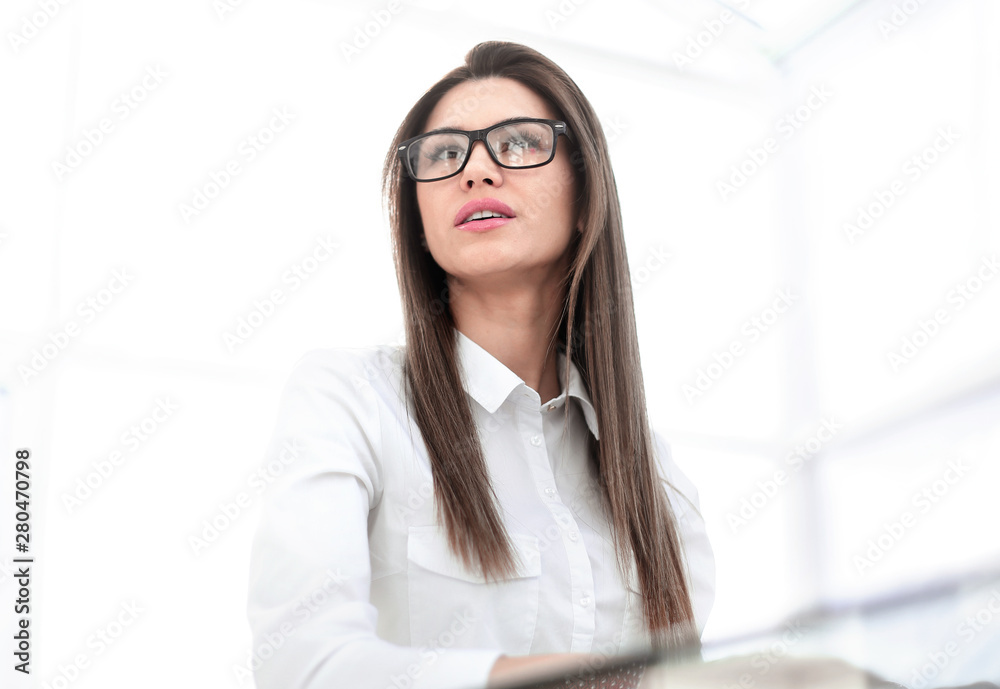 confident business woman sitting at the office Desk confident business woman sitting at the office Desk
