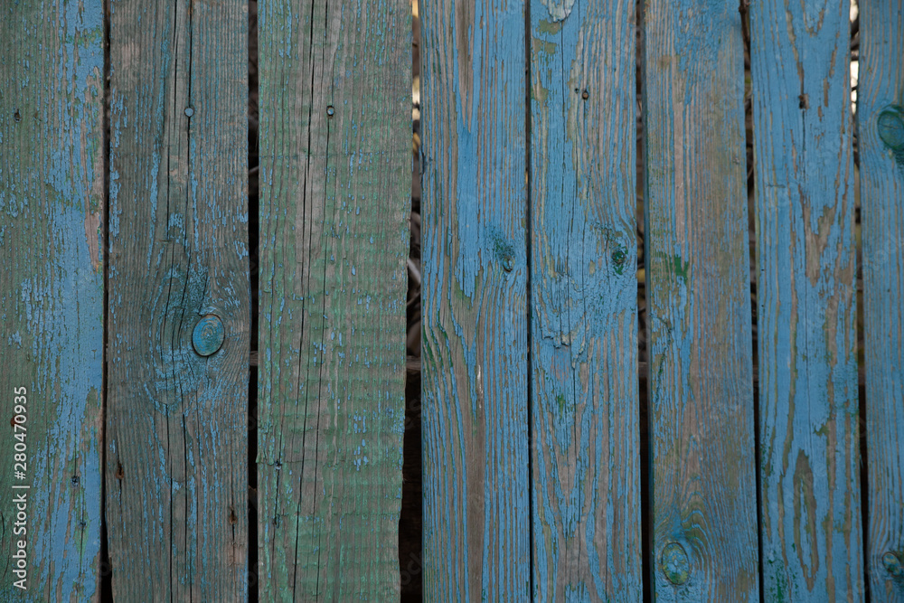 Textured old painted wooden plank background.
