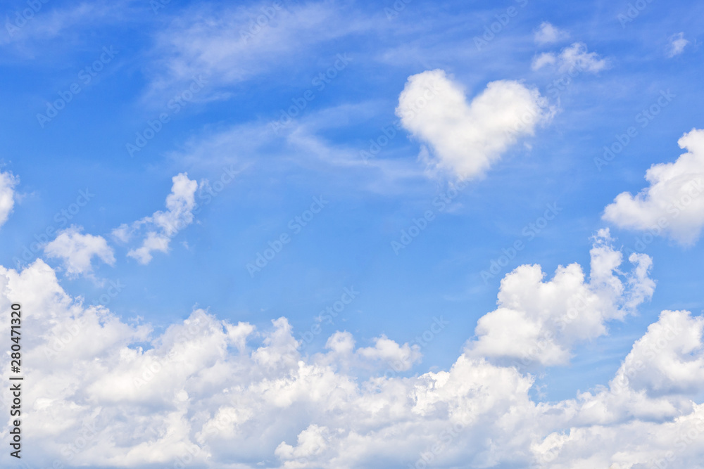 Summer sky with heart shaped cumulus cloud Summer sky with heart shaped cumulus cloud