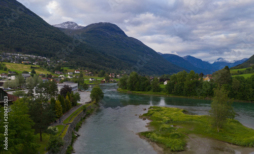 Sunset over river Stryneelva and Loen village at Stryn, Norway, july 2019. photo